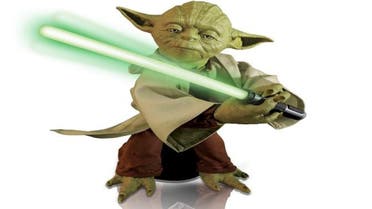 This product image provided by Spin Master Corp. shows the company's Legendary Yoda toy. The toy is 16 inches tall and boasts lifelike movements and voice recognition. (Spin Master Corp. via AP)