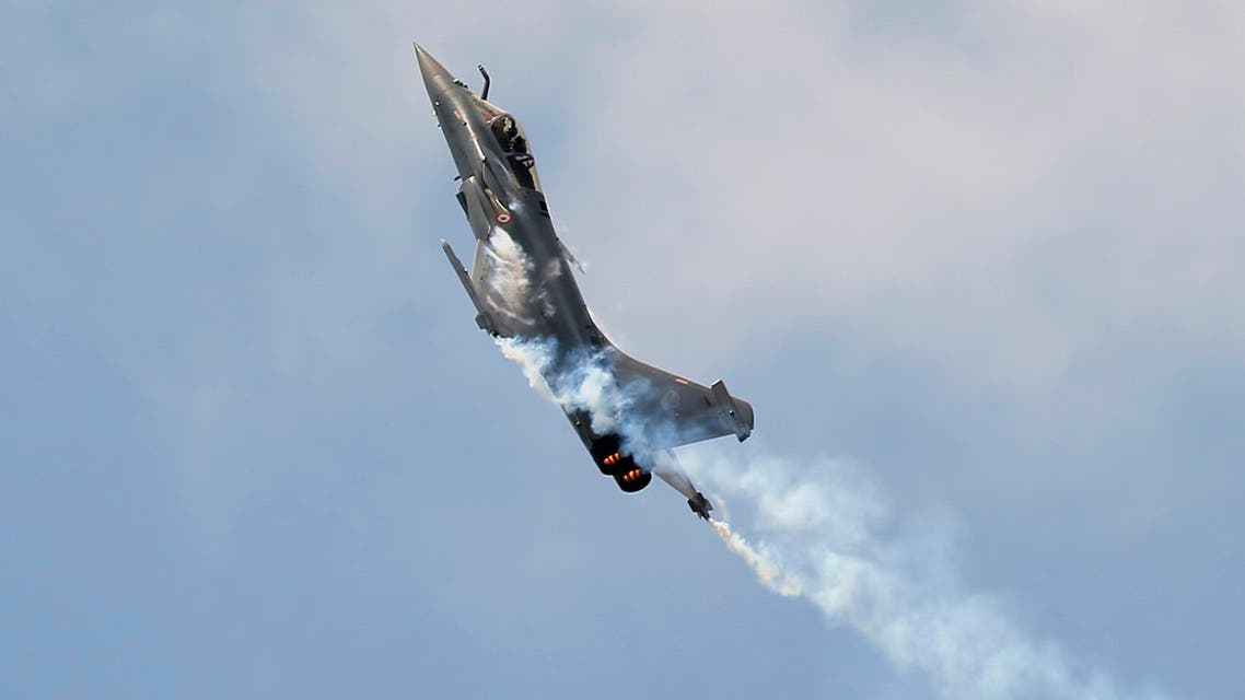 A Rafale Jet Fighter performs during a demonstration flight at the Paris Air Show, in Le Bourget airport, north of Paris, Wednesday, June 17, 2015. AP
