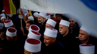 Protests in southern Syrian city after Druze cleric killed