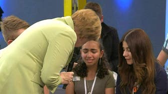 Palestinian girl who cried before Merkel gets German residency