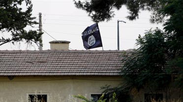 An Islamic State flag flies over the custom office of Syria's Jarablus border gate. (File: Reuters)