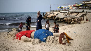 Palestinians paid tribute to the tiny boy who drowned while fleeing the Syrian war by building a sand sculpture of him AFP