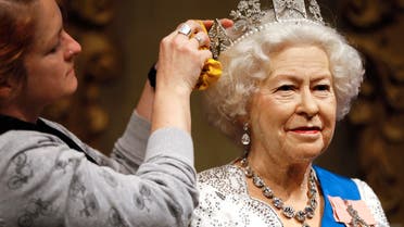 A wax work model of Britain's Queen Elizabeth II is prepared at Madame Tussauds in London, Monday, Sept. 7, 2015. AP