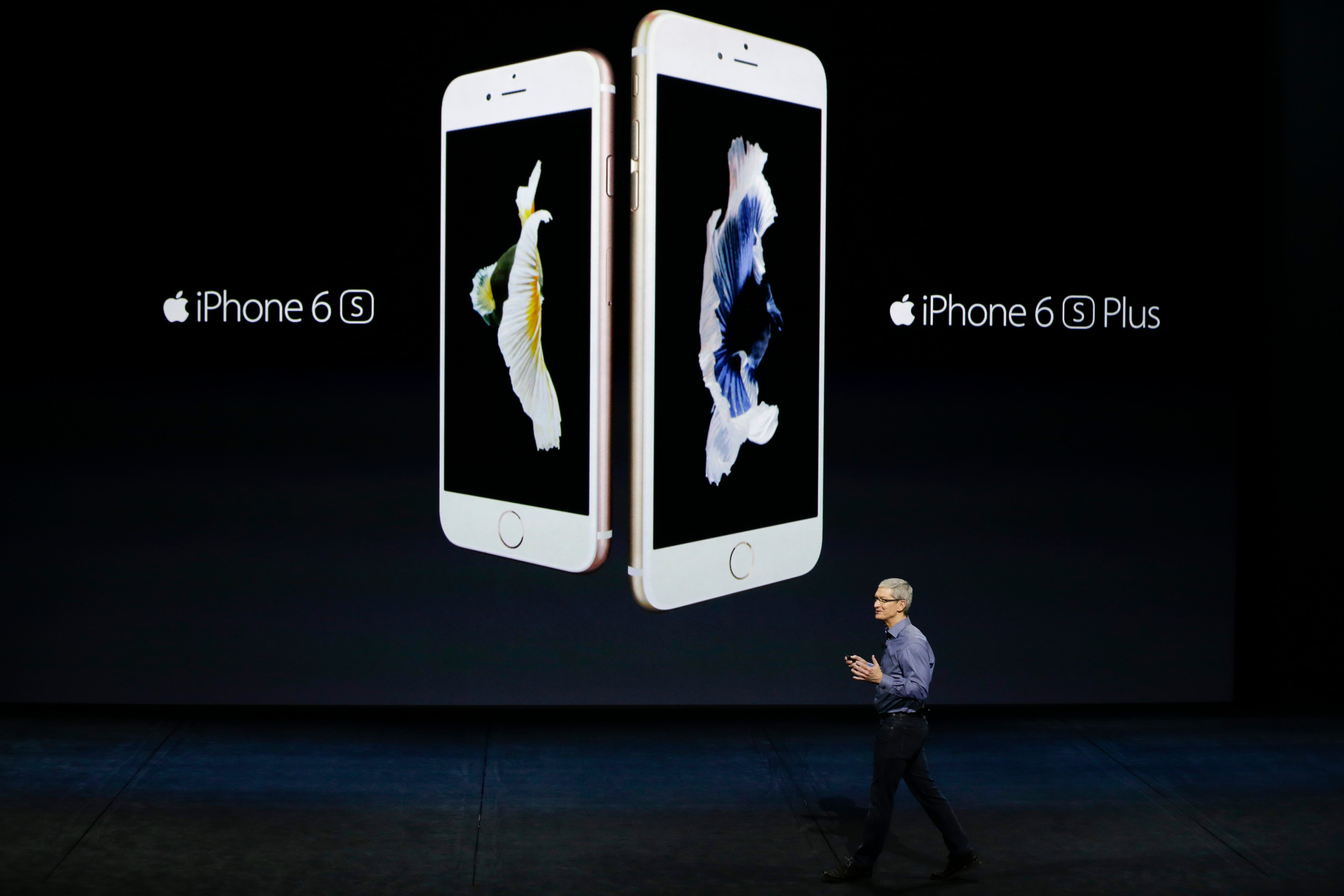 Apple CEO Tim Cook discusses the new iPhone 6s and iPhone 6s Plus during the Apple event at the Bill Graham Civic Auditorium in San Francisco, Wednesday, Sept. 9, 2015. (AP Photo/Eric Risberg)