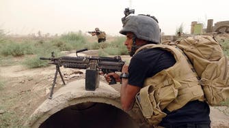 ISIS attacks kill 13 Iraqi troops; Syrian oil field retaken