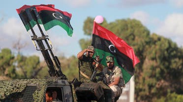 Members of the Libyan army give protection to a demonstration in support of the Libyan army under the leadership of General Khalifa Haftar, in Benghazi, Libya, August 14, 2015. REUTERS/Esam Omran Al-Fetori