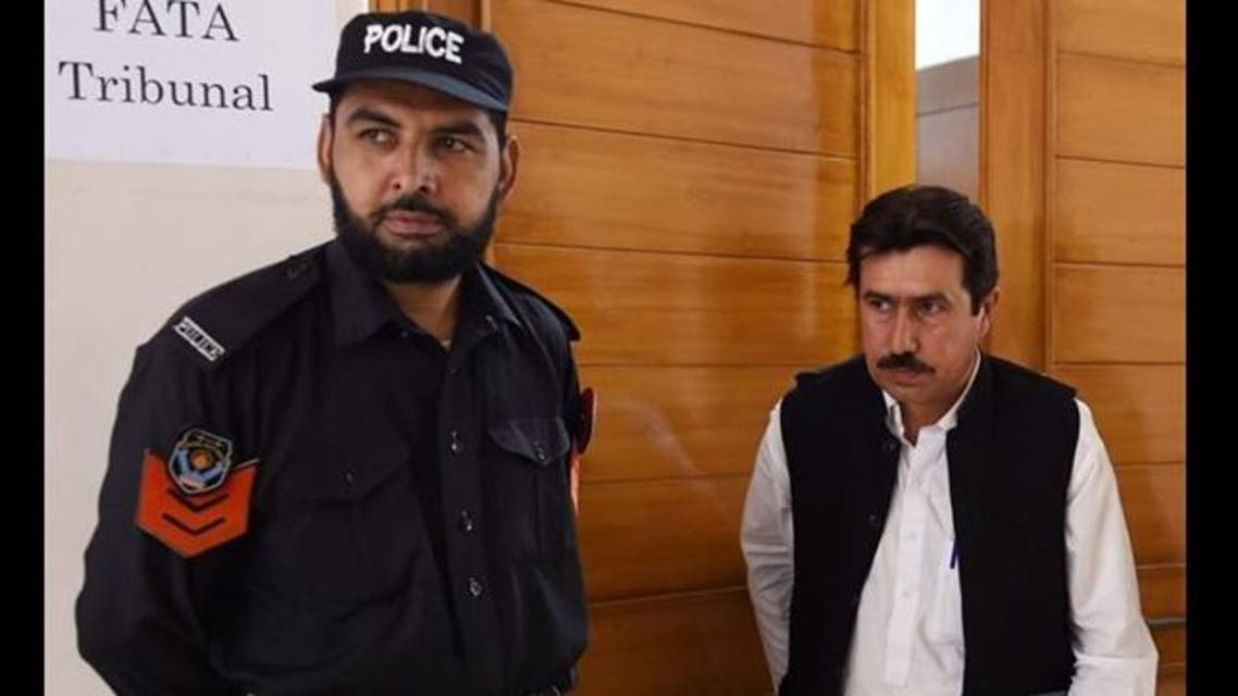 Pakistani lawyer Qamar Nadeem (R), representing doctor Shakeel Afridi who assisted the CIA in their hunt for Osama bin Laden, leaves the court after a hearing in Peshawar on September 9, 2015.