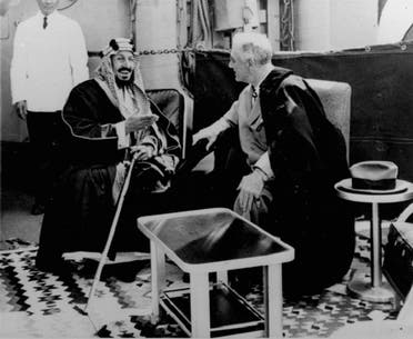 President Roosevelt listens as Saudi King Abdul Aziz speaks with him in French aboard a U.S. warship in this Feb. 20, 1945, AP file photo.