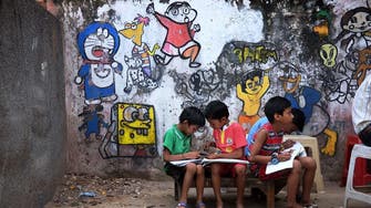 Art school colors slum in Indian capital