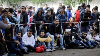 EU backs refugee plan to ease load on border states
