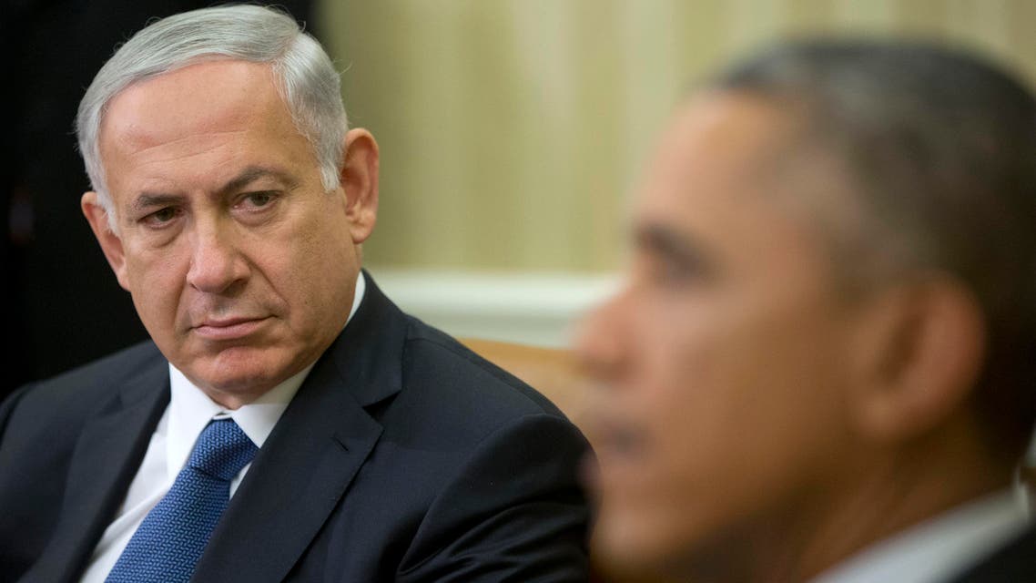 Israeli Prime Minister Benjamin Netanyahu listens as President Barack Obama speaks during their meeting in the Oval Office of the White House in Washington. ap