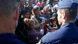 Hungary calls for migrant aid as EU nations squabble