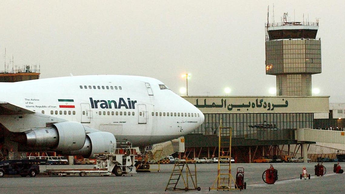 ** FILE ** A Boeing 747 of Iran's national airline is seen at Mehrabad International airport in Tehran, in this June 2003 file photo. Iran's national airline plans to add more American-made planes to its fleet, despite the U.S. aviation sanctions against the Islamic country, an official said Monday March 6, 2006. "There are different purchase projects in hand, including American planes", Malek Barzegar Sedigh, spokesman of Iran Air, Iran's national airline, told the Associated Press. "I do not give further details because then Americans could easily thwart the deal," Sedigh said.(AP Photo/Hasan Sarbakhshian, file)