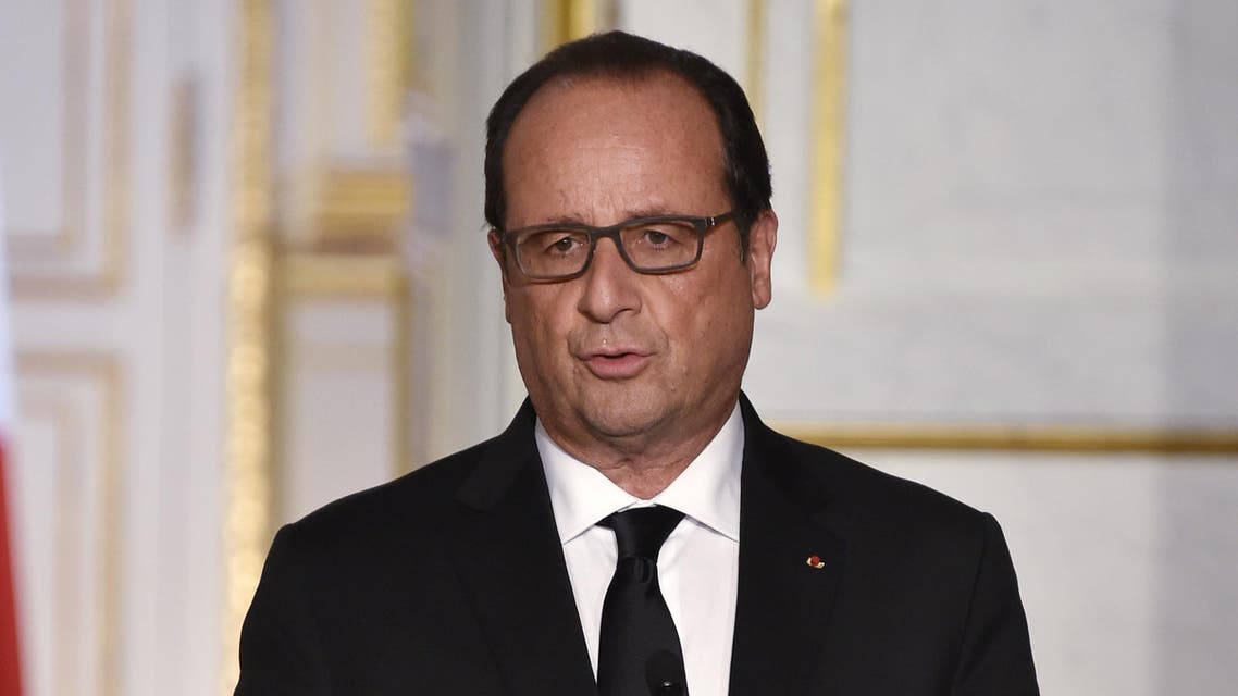 French President Francois Hollande gives a press conference with his Nigerian counterpart at the Elysee Presidential Palace in Paris on September 14, 2015.
