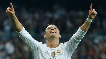 Real Madrid's Cristiano Ronaldo celebrates scoring his side's 3rd goal during a Group A Champions League soccer match between Real Madrid and Shakhtar Donetsk at the Santiago Bernabeu stadium in Madrid, Spain, Tuesday, Sept. 15, 2015. (AP Photo/Francisco Seco)