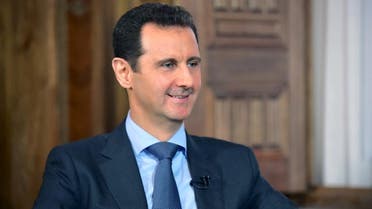Syria's President Bashar al-Assad answers questions during an interview with al-Manar's journalist Amro Nassef, in Damascus, Syria, in this handout photograph released by Syria's national news agency SANA on August 25, 2015. Syrian President Bashar al-Assad said he was open to the idea of a coalition against Islamic State but indicated there was little chance of it happening with his enemies, casting further doubt on a Russian plan to forge an alliance against the militant group. REUTERS/SANA/Handout via Reuters