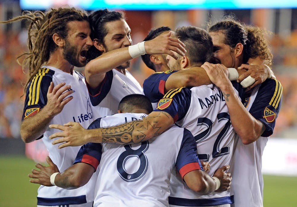 Real Salt Lake forward Juan Manuel Martinez (22) celebrates his goal during the second half of an MLS soccer game against the Houston Dynamo, Saturday, Sept. 12, 2015, in Houston. Real Salt Lake won 3-1. (AP Photo/Eric Christian Smith)