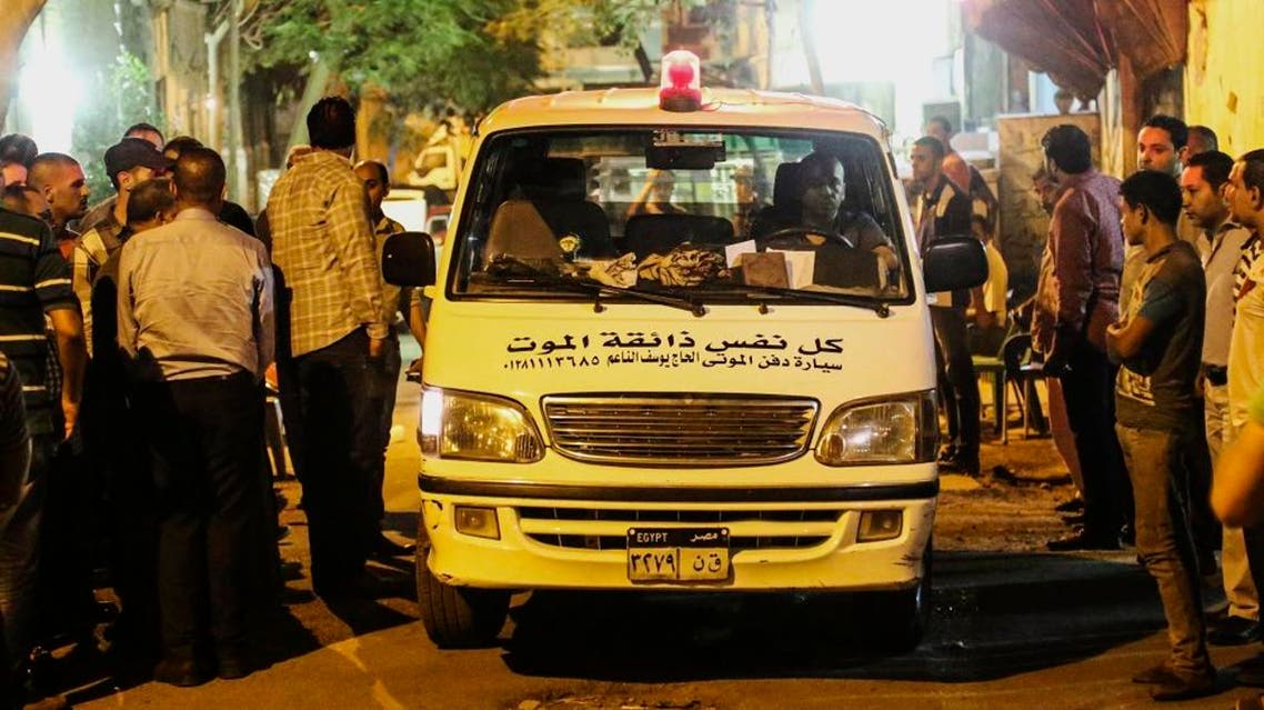 A funeral vehicle carrying an Egyptian victim of Sunday's incident in which Egyptian forces mistakenly opened fire on tourists in the western desert, arrives at a morgue in Cairo, Egypt, Monday, Sept. 14, 2015. Egyptian forces hunting militants in the country's western desert mistakenly opened fire on Mexican tourists on safari, killing 12 people and dealing a further blow to the government's efforts to project an image of stability as it fights an increasingly powerful insurgency, officials said Monday. (AP Photo/Mohamed Elraai)