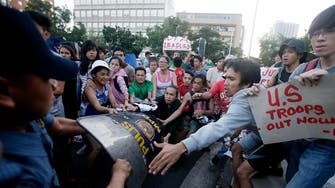 Police break up protest at U.S. Embassy in Manila