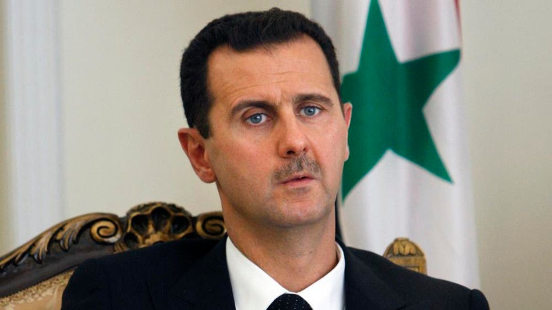 file photo Assad AP