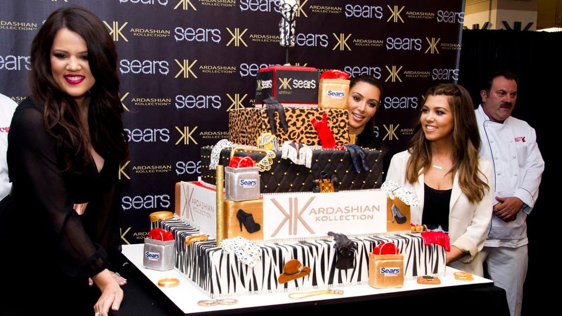 Kardashian sisters, from left, Khloe, Kim and Kourtney celebrate the one year anniversary of the Kardashian Kollection at Sears on Friday, Sept. 14,