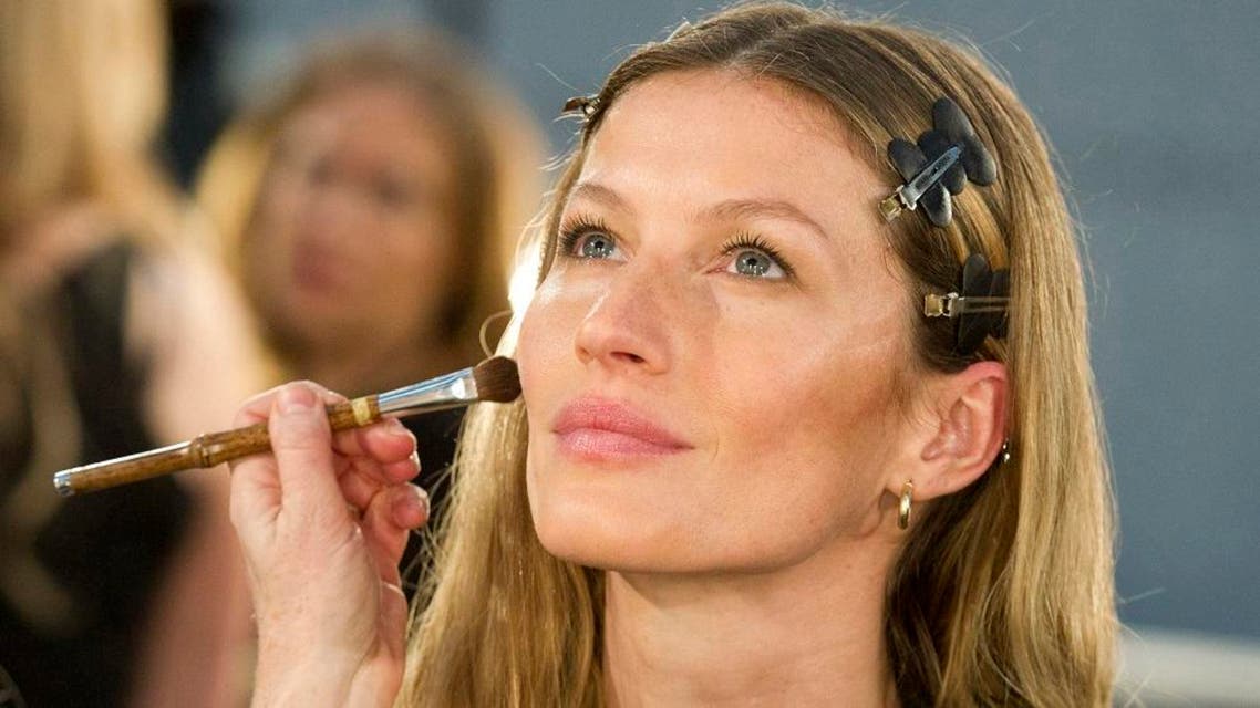 Model Gisele Bundchen appears backstage in preparation for the Alexander Wang show during Fashion Week in New York, Saturday, Feb. 11, 2012. (AP)