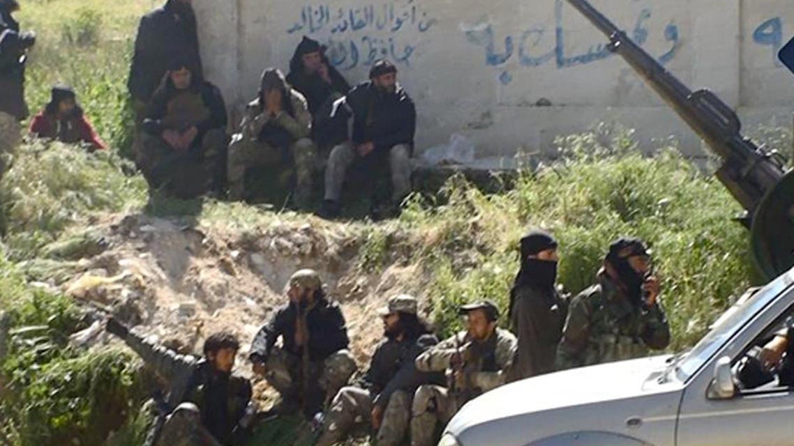 This image posted on the Twitter page of Syria's al-Qaida-linked Nusra Front on Saturday, April 25, 2015, which is consistent with AP reporting, shows Nusra Front fighters in the town of Jisr al-Shughour, Idlib province, Syria. Hard-line Syrian rebel groups entered the strategic town Saturday in northwestern Syria, sending government troops fleeing after intense clashes that have seen them take nearly all of a crucial province. Syria's civil war, now in its fifth year, has killed some 220,000 people, and wounded at least 1 million. (Al-Nusra Front Twitter page via AP)
