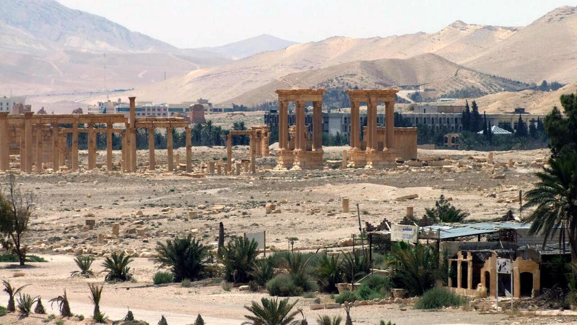  FILE - This file photo released on Sunday, May 17, 2015, by the Syrian official news agency SANA, shows the general view of the ancient Roman city of Palmyra, northeast of Damascus, Syria. Activists say Islamic State militants have destroyed a temple at Syria's ancient ruins of Palmyra. News that the militants blew up the Baalshamin Temple came after the extremists beheaded Palmyra scholar Khaled al-Asaad on Tuesday, hanging his bloodied body from a pole in the town's main square. (SANA via AP, File)