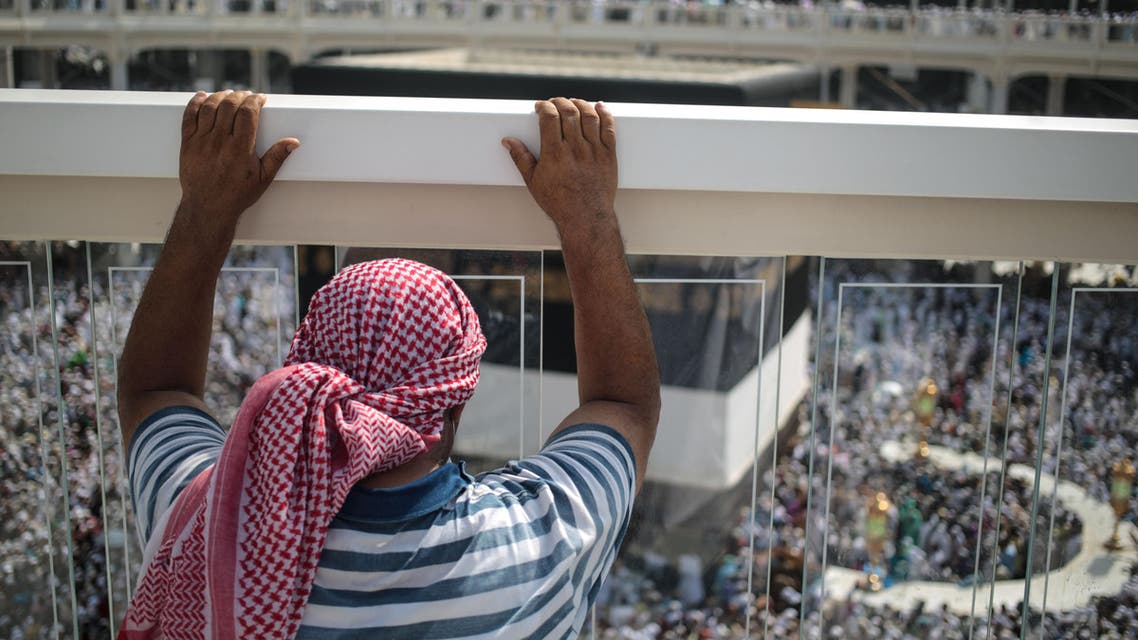 A Muslim pilgrim prays while facing the Kaaba, the cubic building at the Grand Mosque in the Muslim holy city of Mecca, Saudi Arabia, Sunday, Sept. 15, 2015. (AP)