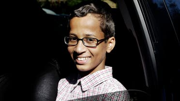Ahmed Mohamed, 14, smiles as he sits in a vehicle before leaving his family's home in Irving, Texas, Thursday, Sept. 17, 2015.  (AP)