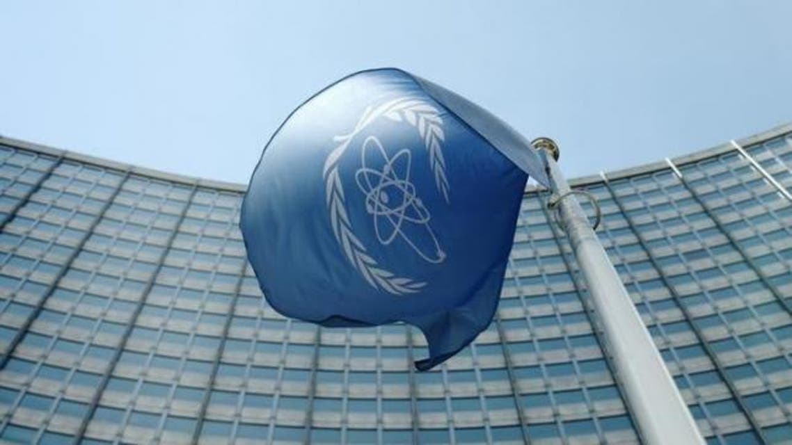 The flag of the International Atomic Energy Agency (IAEA) flies in front of its headquarters in Vienna, Austria, May 28, 2015. REUTERS