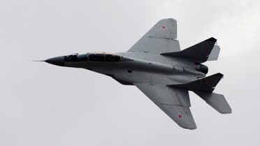In this Saturday, Aug. 11, 2012 file photo, a Russian MiG-29 plane flies during a celebration marking the Russian air force's 100th anniversary in Zhukovsky, outside Moscow, Russia.