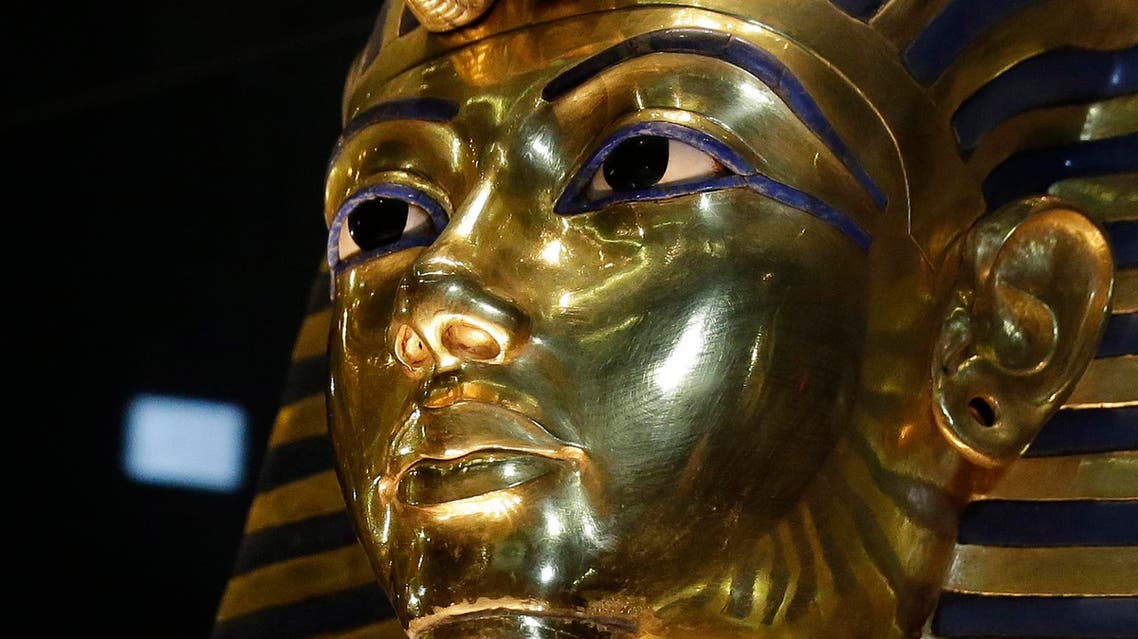 The gold mask of King Tutankhamun is seen in its glass case during a press tour, in the Egyptian Museum near Tahrir Square, Cairo, Egypt, Saturday, Jan. 24, 2015. AP