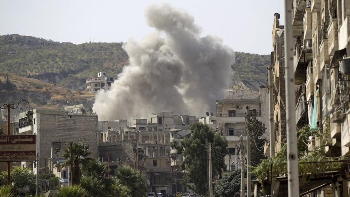 Smoke rises after what activists said was an airstrike by forces loyal to Syria's President Bashar al-Assad in the northwestern city of Ariha, in Idlib province, Syria September 19, 2015. REUTERS/Khalil Ashawi