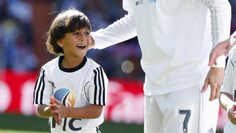 Son of tripped Syrian refugee accompanies Ronaldo at game