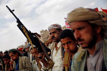 A Shiite Houthi rebel holds his weapon as he attends a rally to protest Saudi-led airstrikes, in Sanaa, Yemen, Monday, Aug. 24, 2015. AP