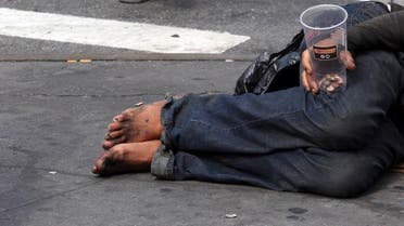 A homeless man asks for money on 14th Street, Friday, Sept. 4, 2015, in New York. The number of homeless on New York City's streets has increased, prompting breathless media coverage and worries that the "bad old days" are returning to the Big Apple. (AP Photo/Mary Altaffer)