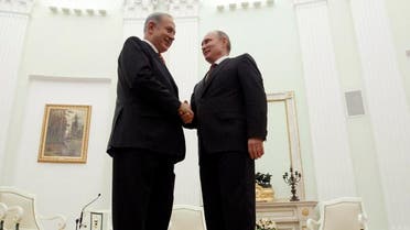 Russian President Vladimir Putin, right, shakes hands with Israeli Prime Minister Benjamin Netanyahu during their meeting in the Kremlin in Moscow, Russia, Wednesday, Nov. 20, 2013. (AP)