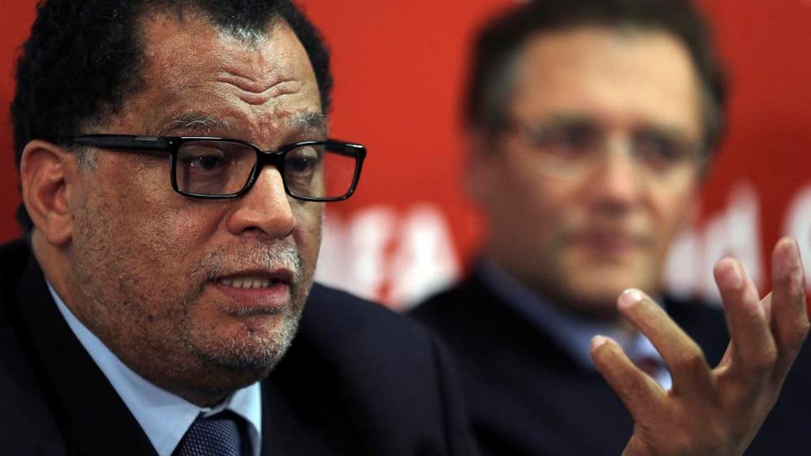 South African sports administrator Danny Jordaan, left, speaks as FIFA secretary general Jerome Valcke, right, looks on during the 2010 FIFA World Cup Legacy Trust media conference in Johannesburg, South Africa, Friday Jan.18, 2013. (AP Photo/Themba Hadebe)