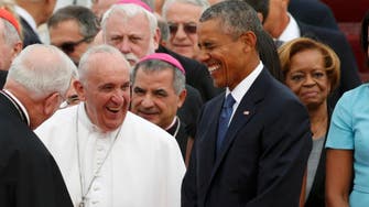 Met by Obama, Pope Francis arrives in U.S.