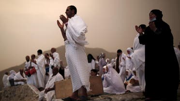Muslim pilgrims pray on Mount Mercy on the plains of Arafat during the annual haj pilgrimage, outside the holy city of Makkah on September 22, 2015. (Reuters)