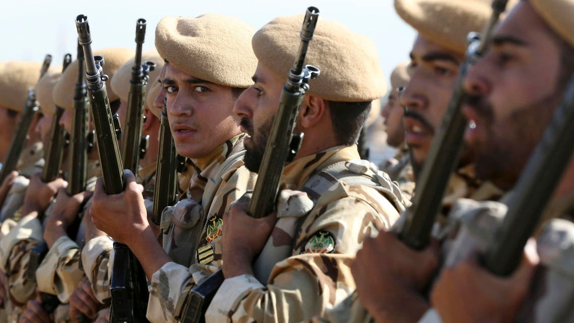 Iranian army troops conclude their march in a military parade marking the 35th anniversary of Iraq's 1980 invasion of Iran, in front of the shrine of late revolutionary founder Ayatollah Khomeini, just outside Tehran, Iran, Tuesday, Sept. 22, 2015. AP