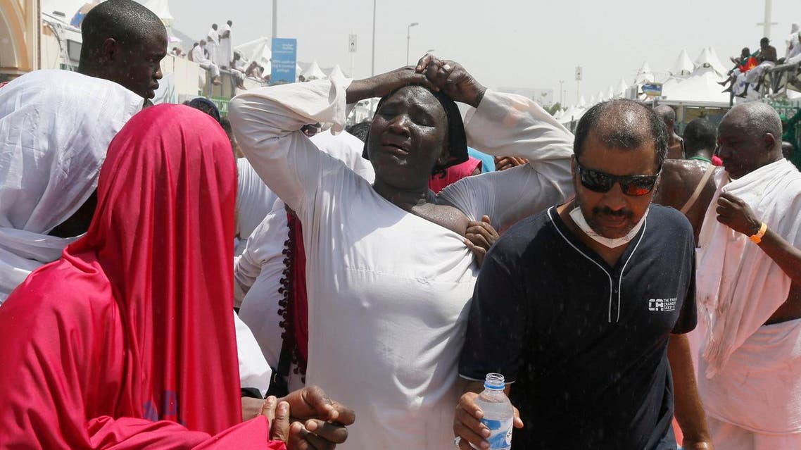 A pilgrim reacts with grief near the site of the stampede in the camp city of Mina. (Essa Al-Dobisi/Al Arabiya)