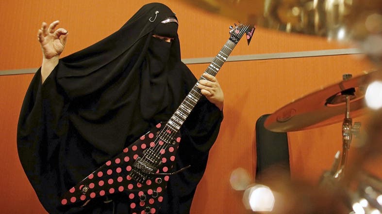 Meet Marie, the burqa-wearing Muslim heavy metal guitarist 