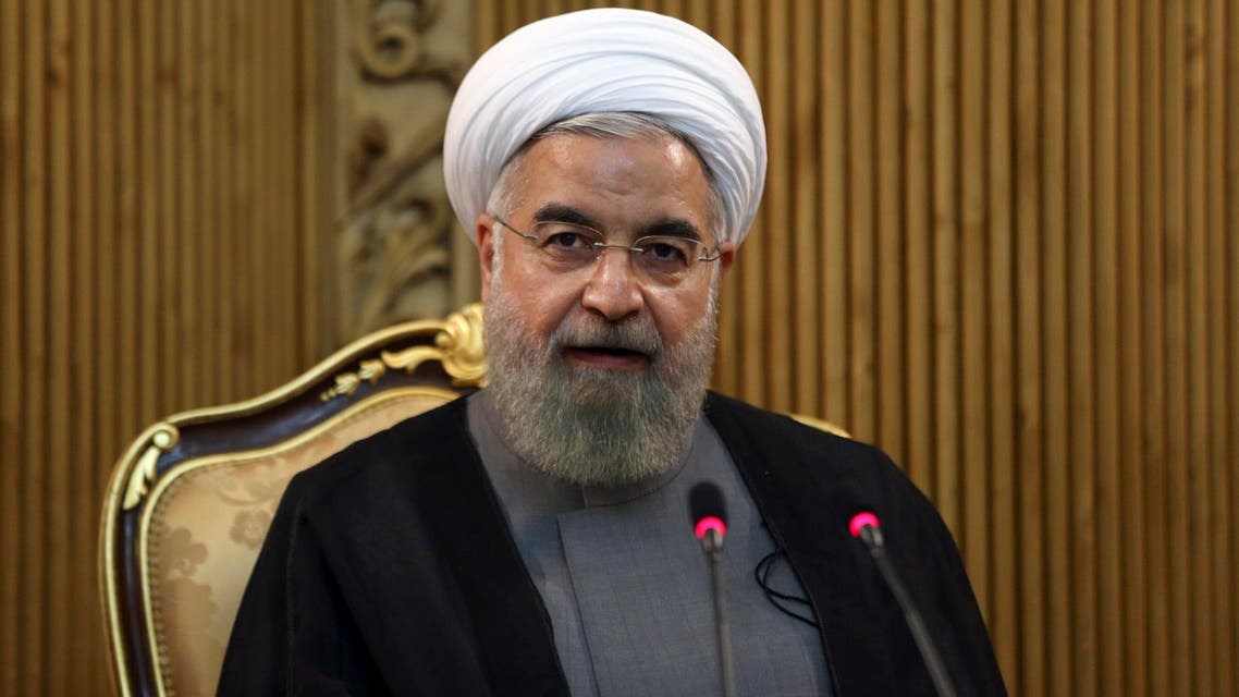 Iranian President Hassan Rouhani briefs media at the Mehrabad airport prior to leaving Tehran, Iran, for New York to attend the United Nations General Assembly, Thursday, Sept. 24, 2015. (AP)