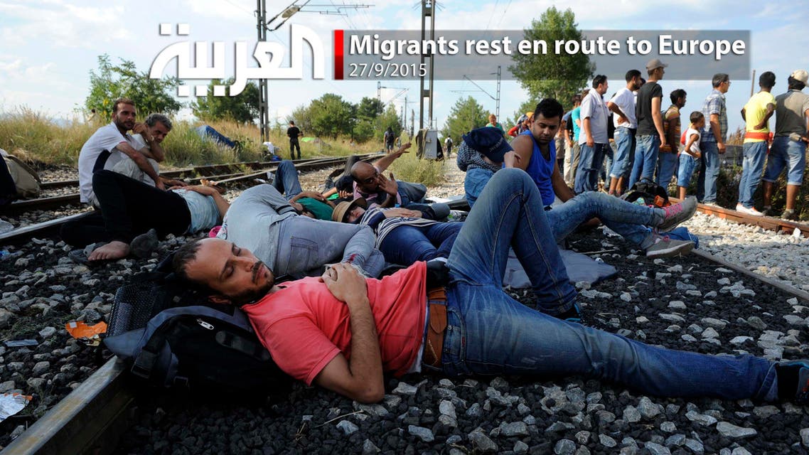 Migrants rest en route to Europe