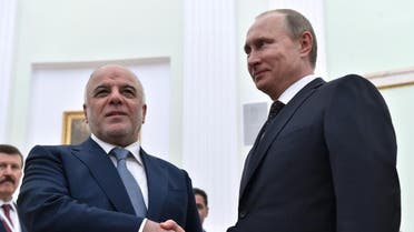 Russian President Vladimir Putin, right, shakes hands with Iraqi Prime Minister Haydar al-Abadi during their meeting in the Kremlin in Moscow. (File photo: AP)