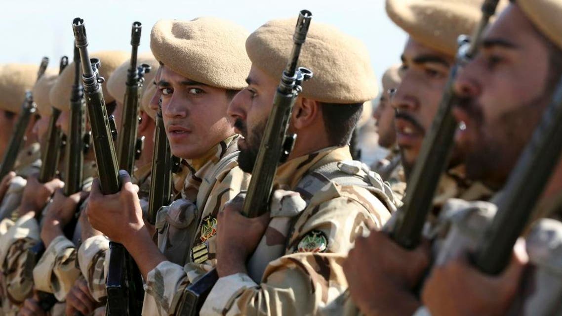 Iranian army troops conclude their march in a military parade in front of the shrine of late revolutionary founder Ayatollah Khomeini, just outside Tehran, Iran, Tuesday, Sept. 22, 2015. (AP)