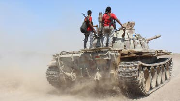 Fighters against Shiite rebels known as Houthis ride on a tank near the strait of Bab al-Mandab, west of the southern port city of Aden, to take back the control of the strait, Yemen, Friday, Oct. 2, 2015. (AP)