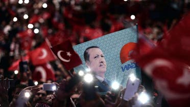 Supporters of Turkish President Recep Tayyip Erdogan attend a political rally in Strasbourg, eastern France, on October 4, 2015. afp